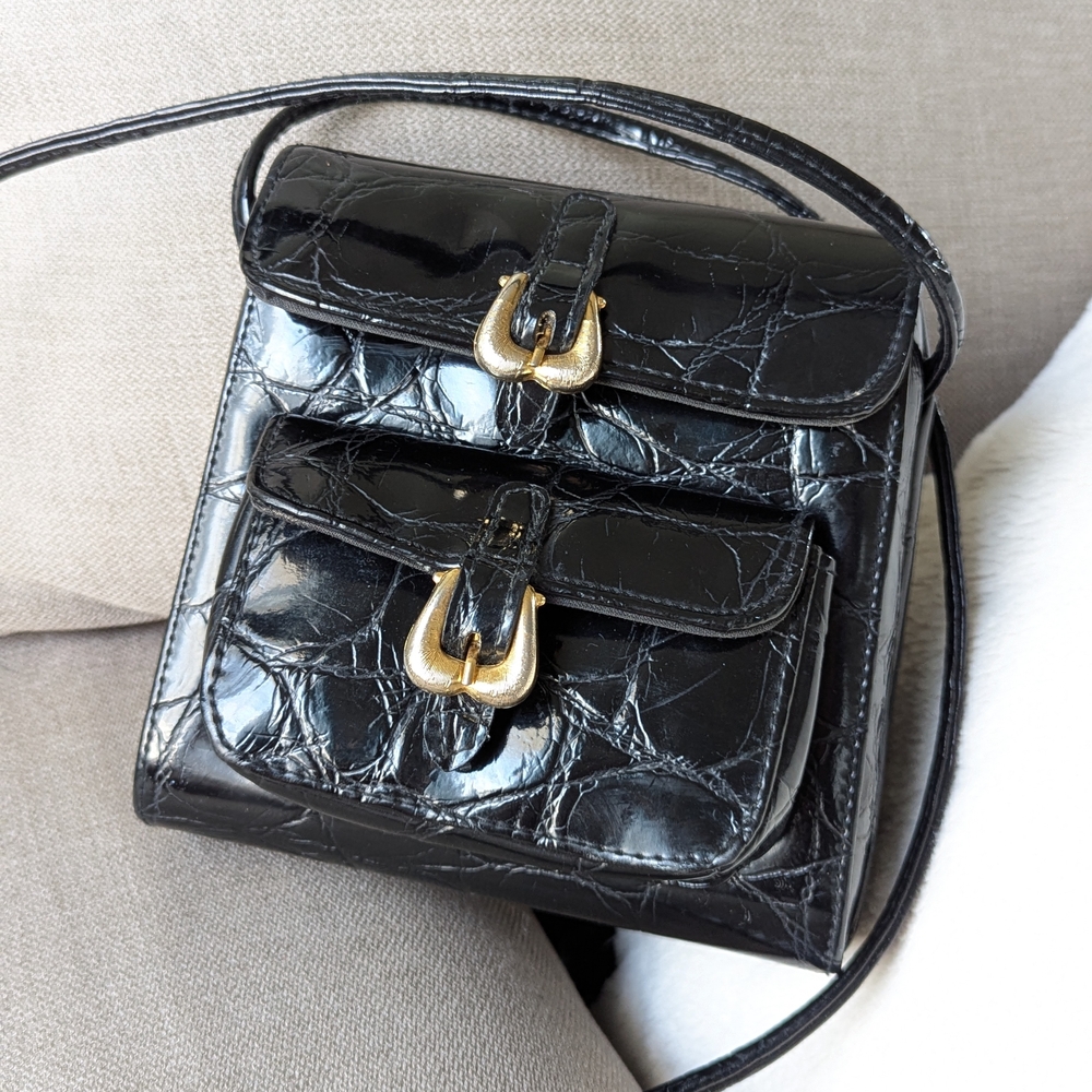 Classic Elegant Black Leather Bag with Gold Accents